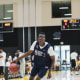 Christian Koloko dribbles around a pylon at the 2018 Basketball Without Borders camp in Los Angeles